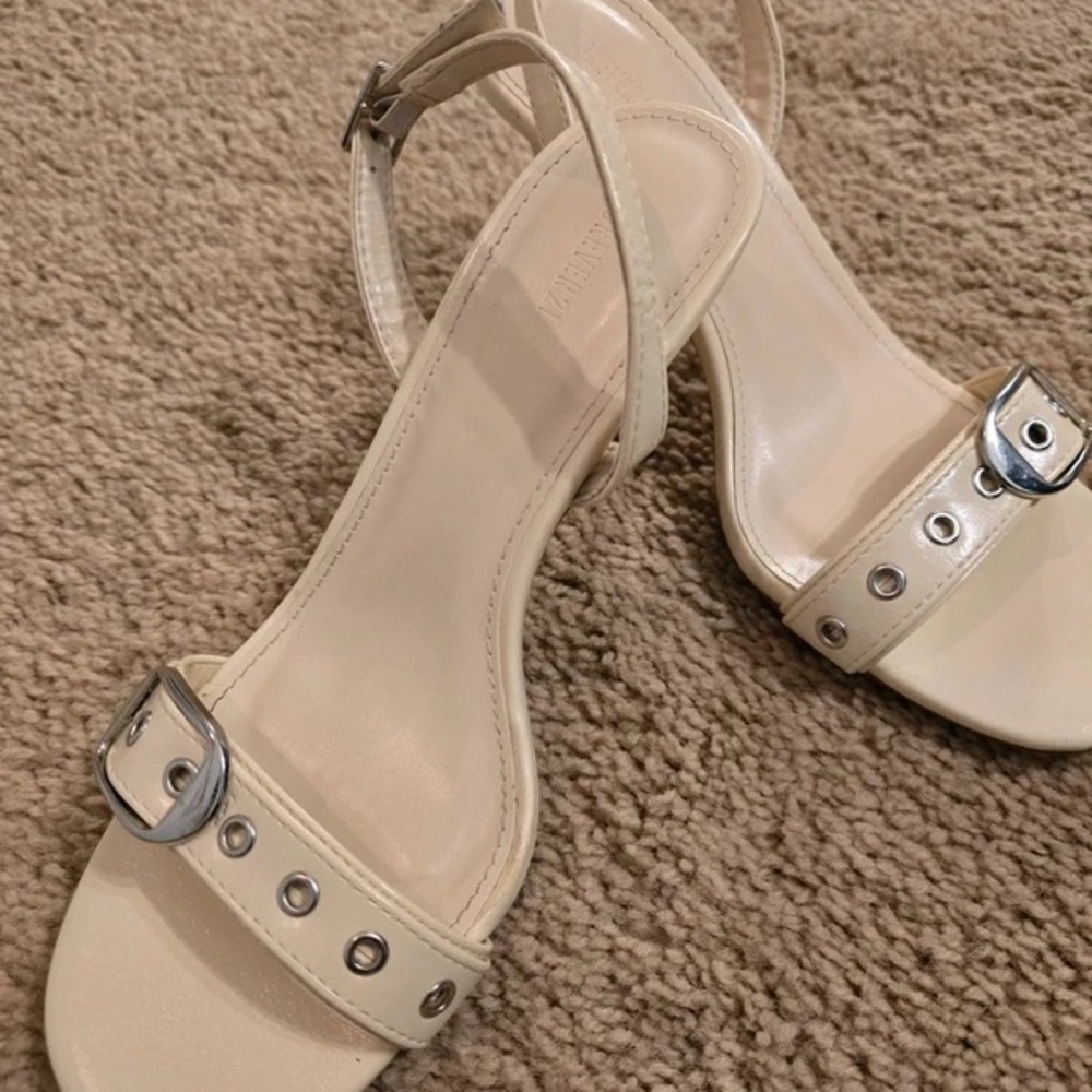 Elegant Cream Heels with Buckle Accent